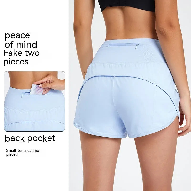 Women's black high-waist quick-dry nylon sports shorts for running and fitness.