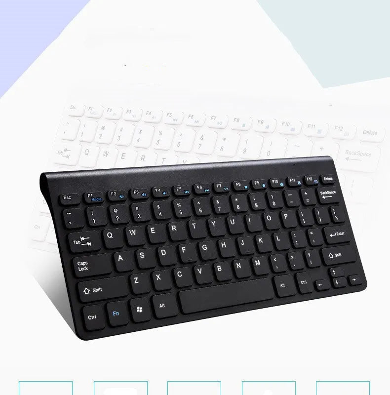 Black wireless keyboard and mouse set with 4G receiver on wooden desk
