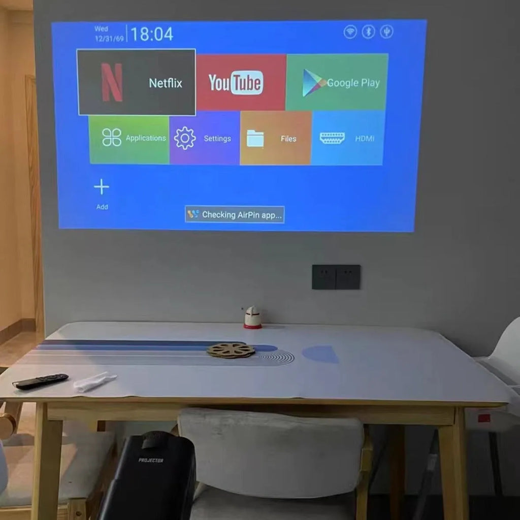 720p HD wireless home projector for gaming and screen projection on a table.