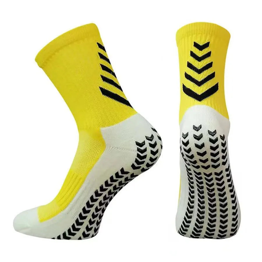 Men's mid-calf athletic socks with non-slip silicone grip in geometric patterns