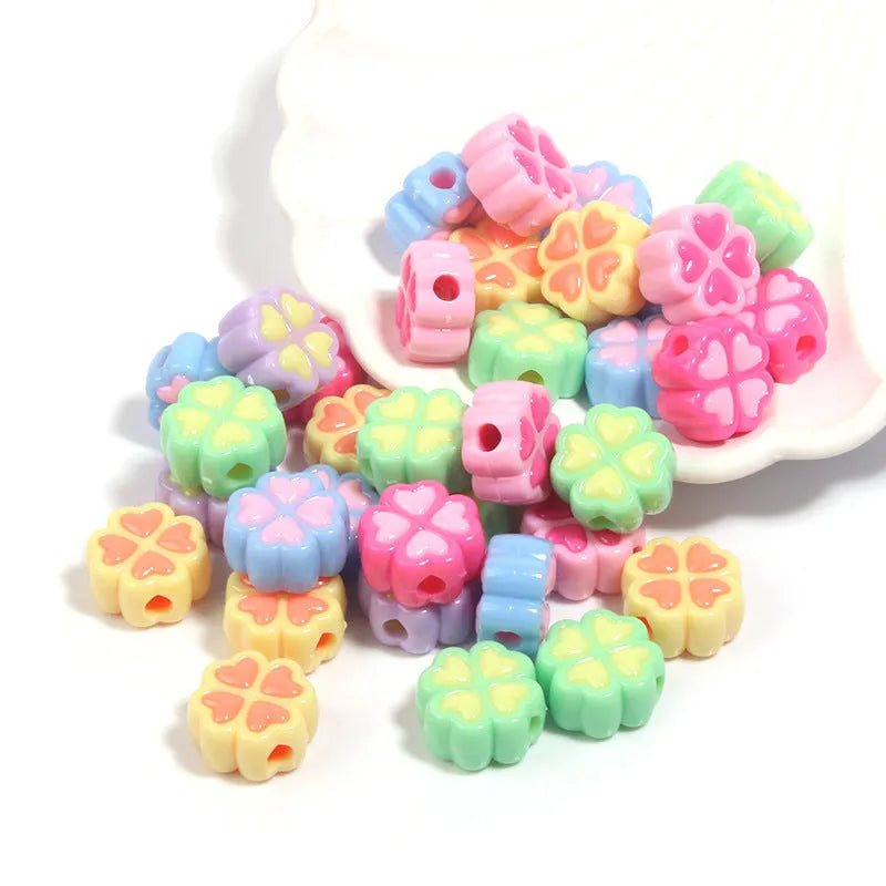 15mm frosted acrylic four-leaf clover love beads in mixed colours including rose red, pink, yellow, green, blue, purple.