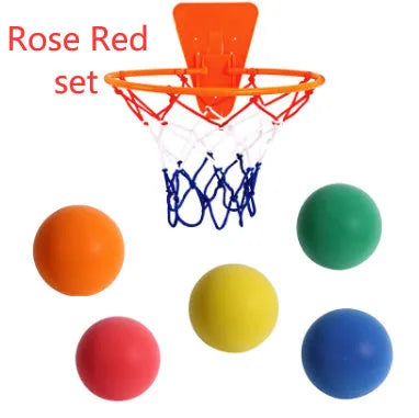 Silent foam basketball training ball in assorted bright colours with basketball hoop