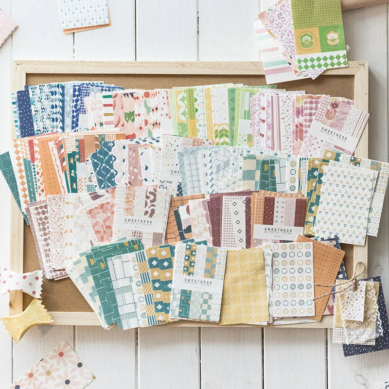 50 pieces of retro dessert-themed note paper in assorted colours measuring 56mm by 83mm