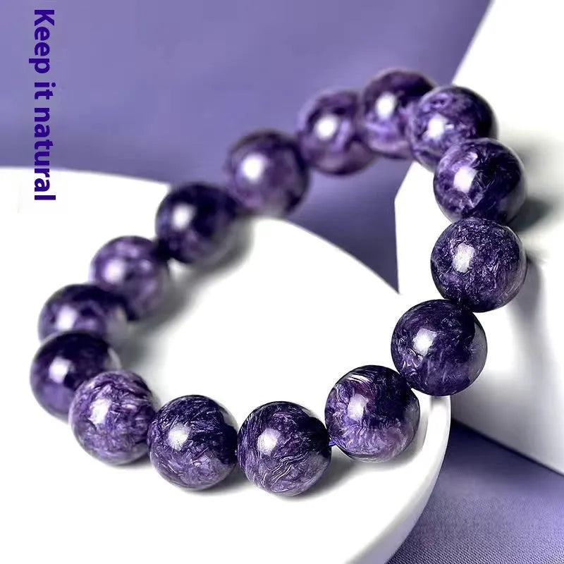 Crystal bracelet with transparent charoite beads in Platinum colour, showing different bead size options.