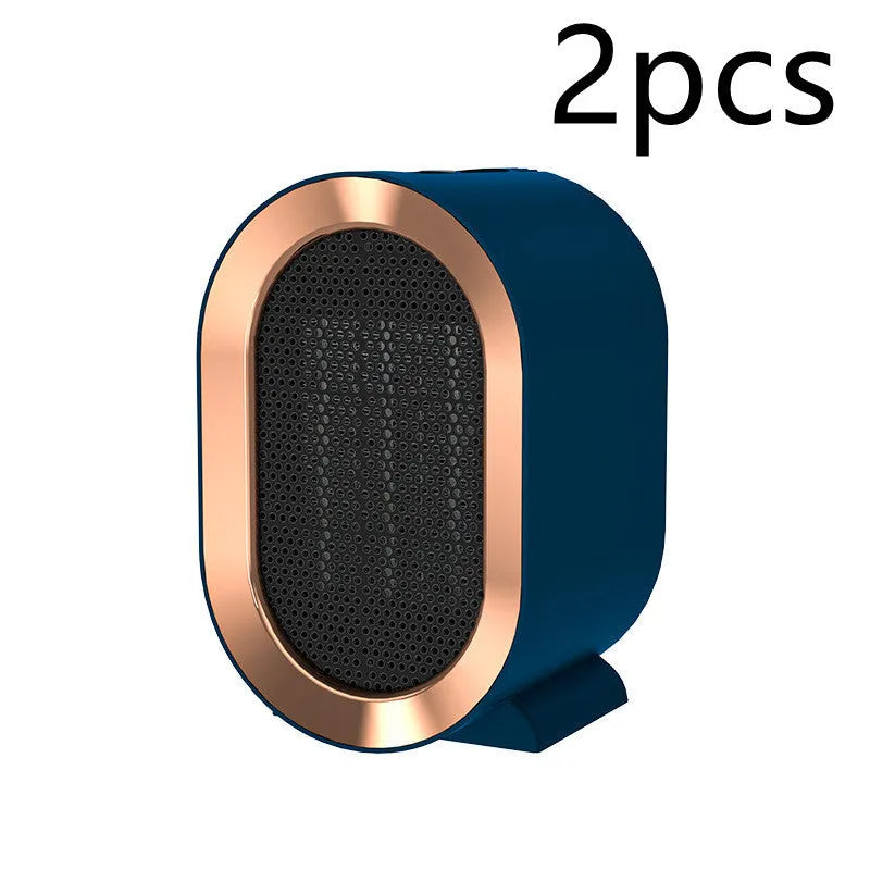 Desktop electric ceramic fan heater in black finish with mechanical controls