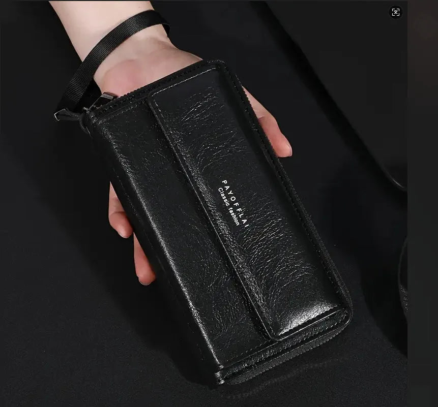 Long men's bifold wallet in PU leather showing multiple card slots and compartments.