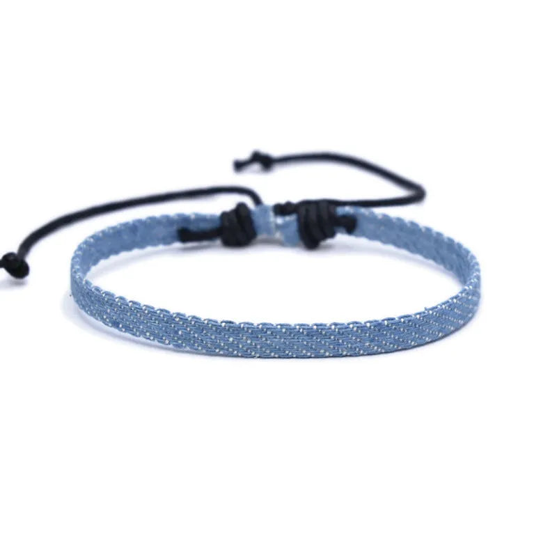 Handmade denim fabric bracelet strap for travel memories, shown in one of eleven colour variants
