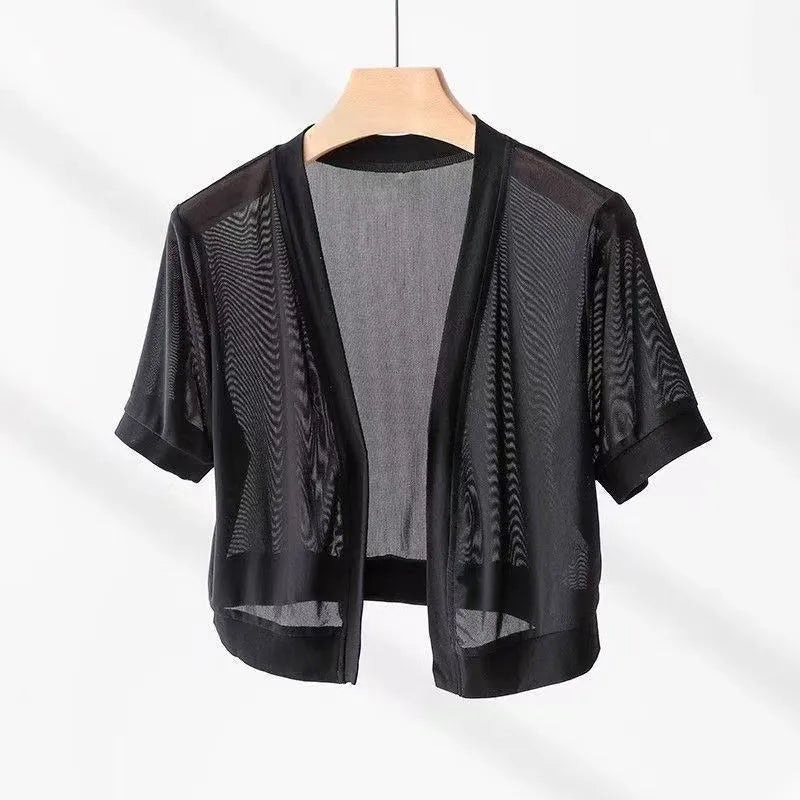 Women's French-style irregular collar long sleeve shirt with bell sleeves and a tie front.