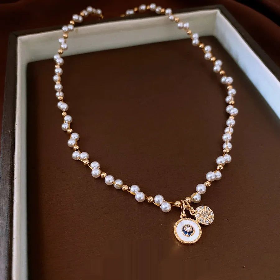 Real gold electroplated zircon pearl pendant necklace with round geometry design on adjustable clavicle chain