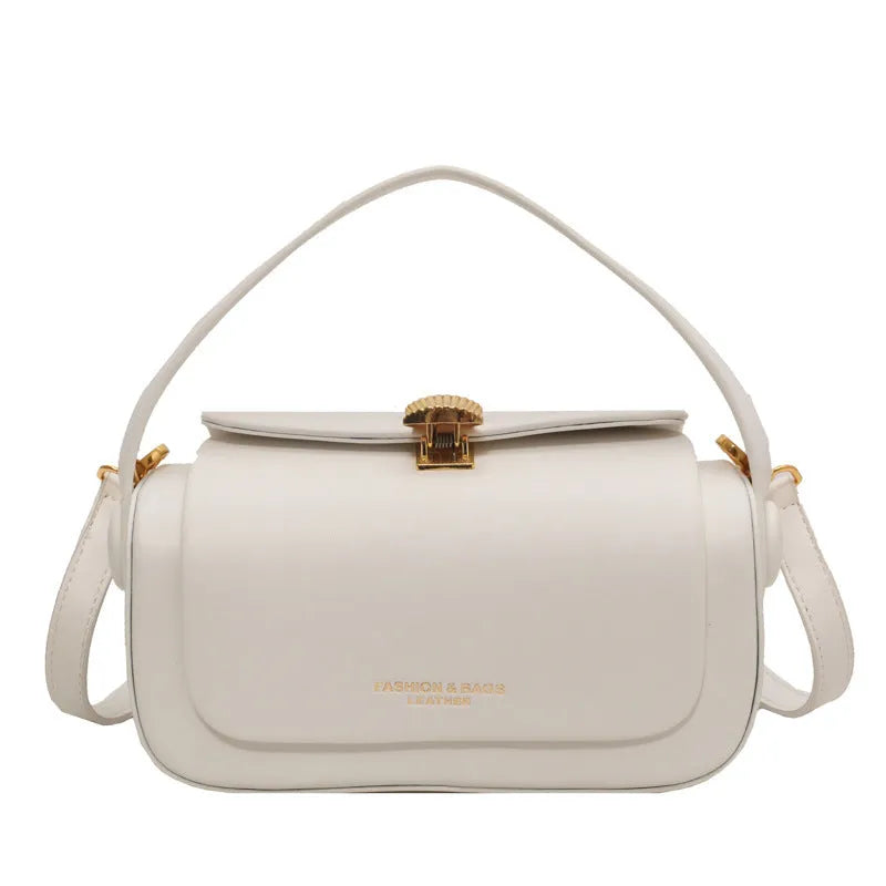 Women's personalised PU leather messenger bag with embossed lettering in beige colour