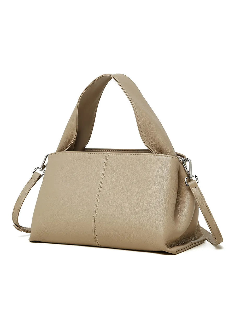 Women's genuine leather messenger bag in horizontal square shape with double shoulder strap, shown in apricot colour.
