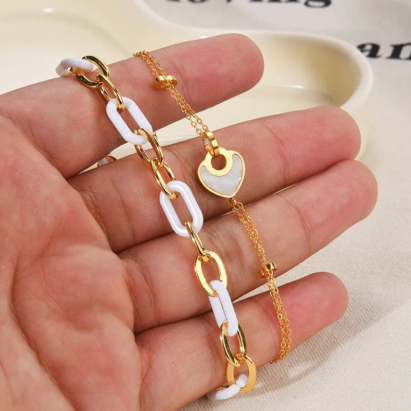 Women's stainless steel resin bracelet with double-layer heart design