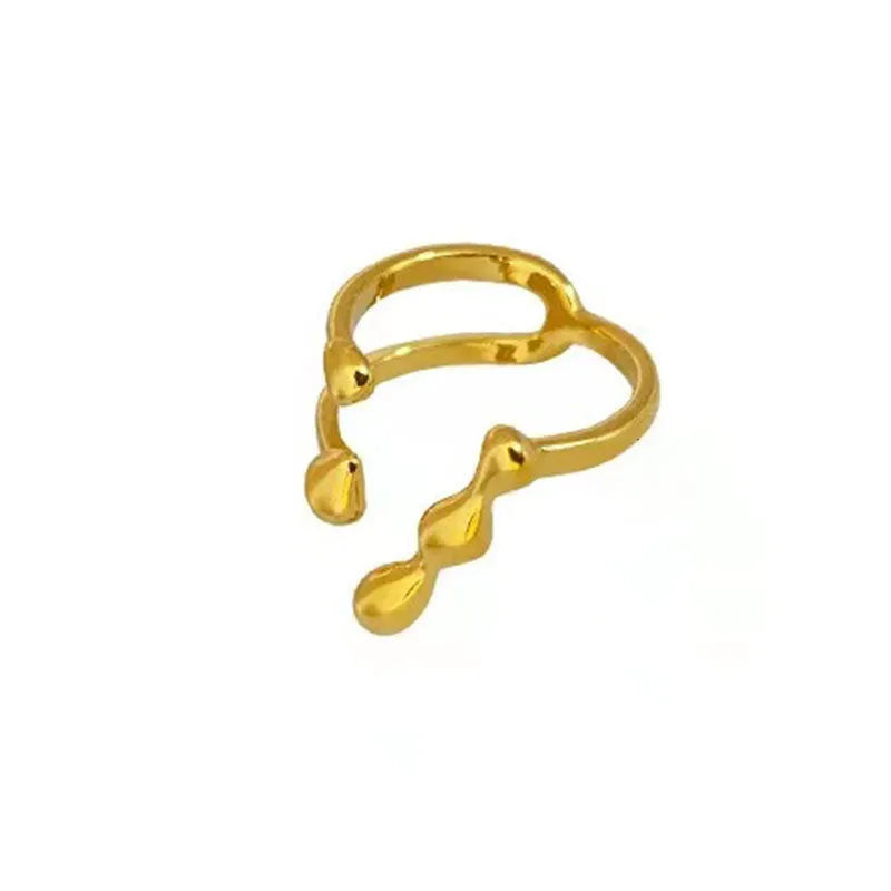 Adjustable brass opening ring with spherical design in gold or silver colour
