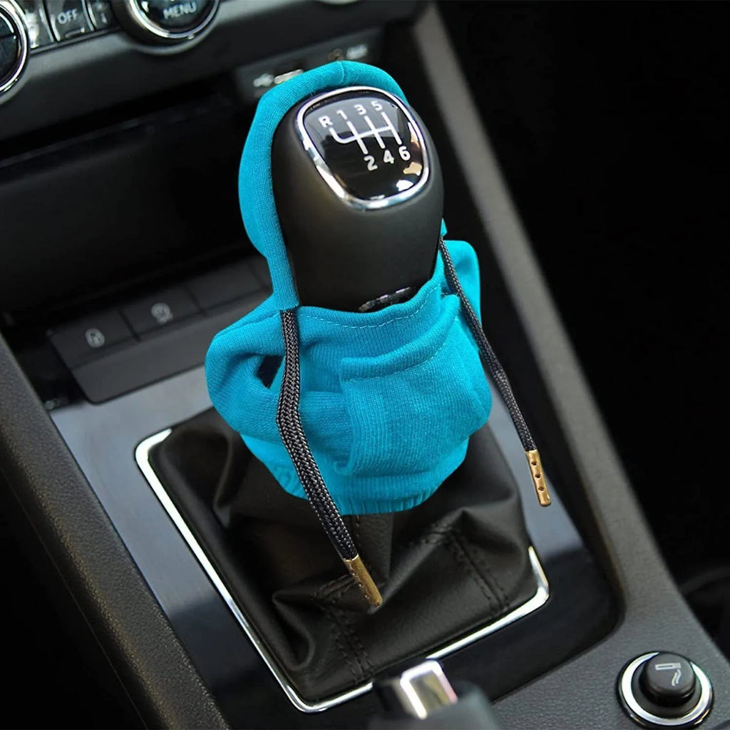 Blue cloth gear shift knob hoodie cover on a car gear lever