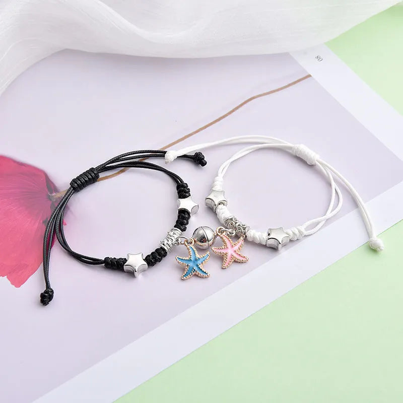 Magnetic couple bracelets with crown design and electroplating finish