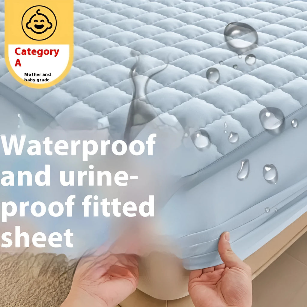 Blue washed cotton waterproof fitted sheet with elasticated corners shown on mattress