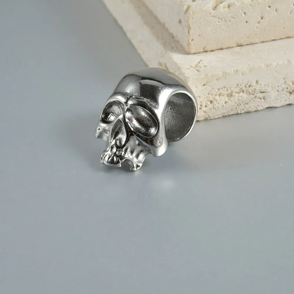 Stainless steel hollow skull Buddha geometric earrings with electroplated colour finishes