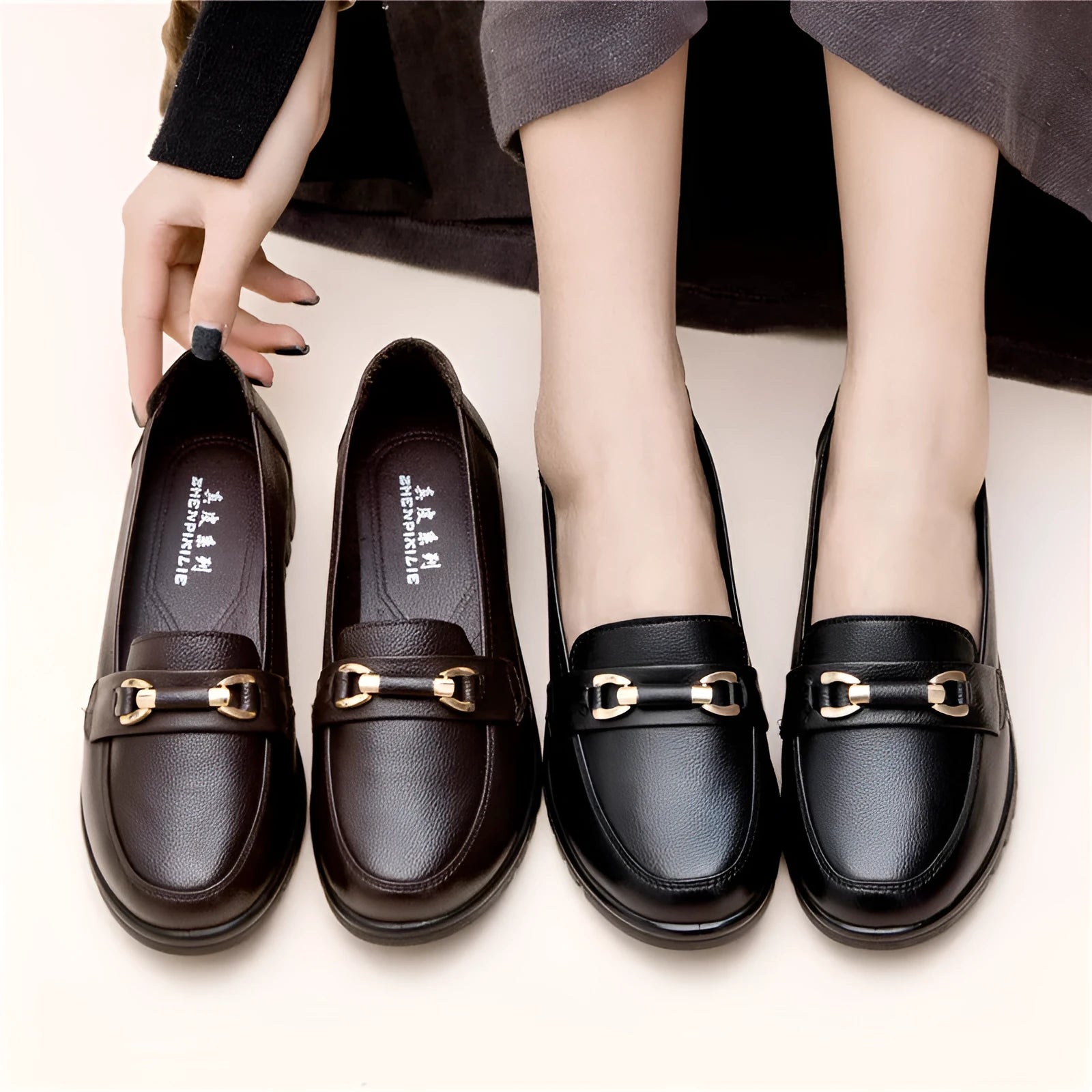 Black microfiber casual pumps with a round toe and low flat heel