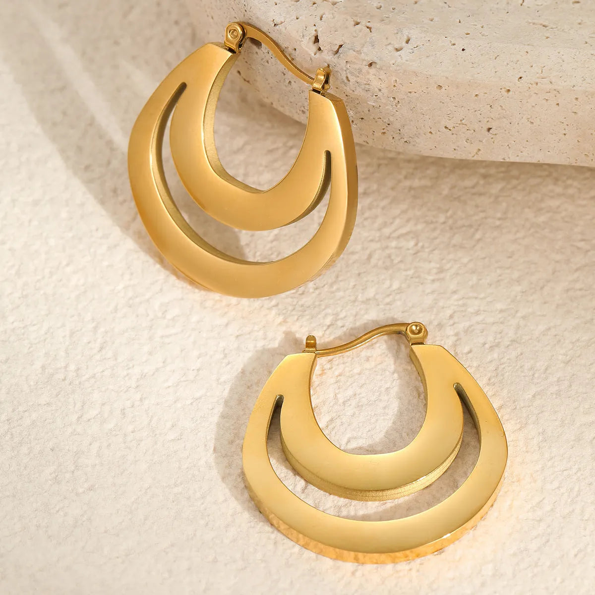 Geometric French earrings with round ring design in gold metallic finish