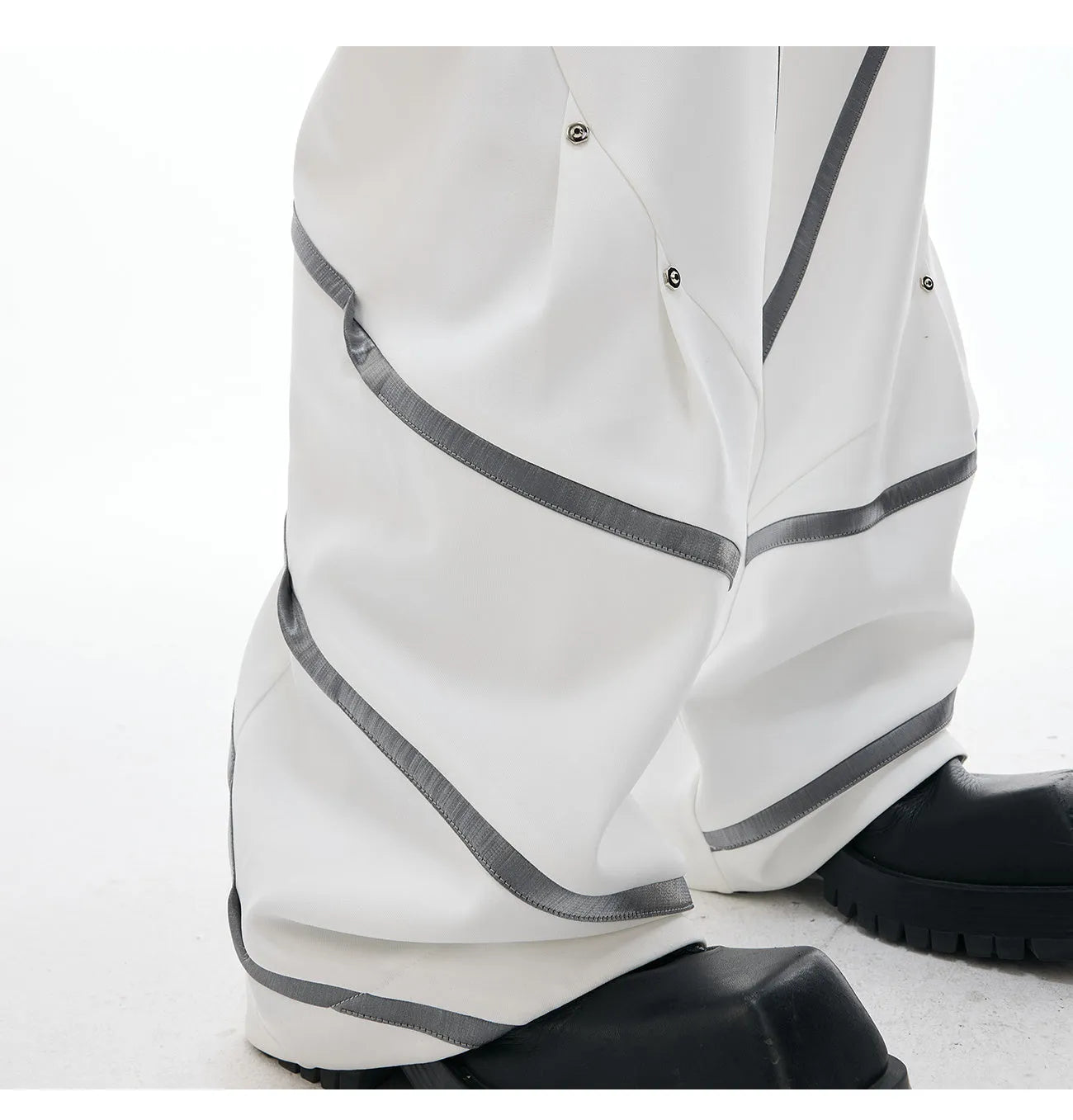 Men's black trousers with metal striped rivet pleats and three-dimensional cutting detail