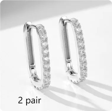 Sterling silver oval zircon ear clip earrings with geometric design in white or yellow colour