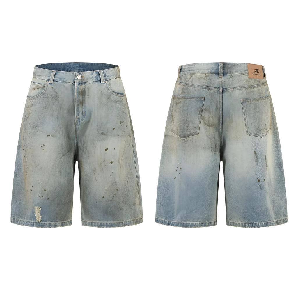 Blue washed denim cropped middle pants with straight leg and zipper fly on a model.