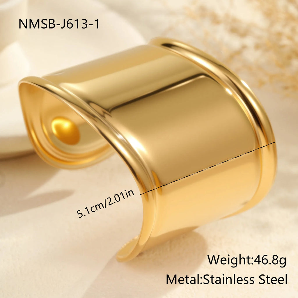Women's 18K gold plated stainless steel bracelet with exaggerated wide wave geometric design