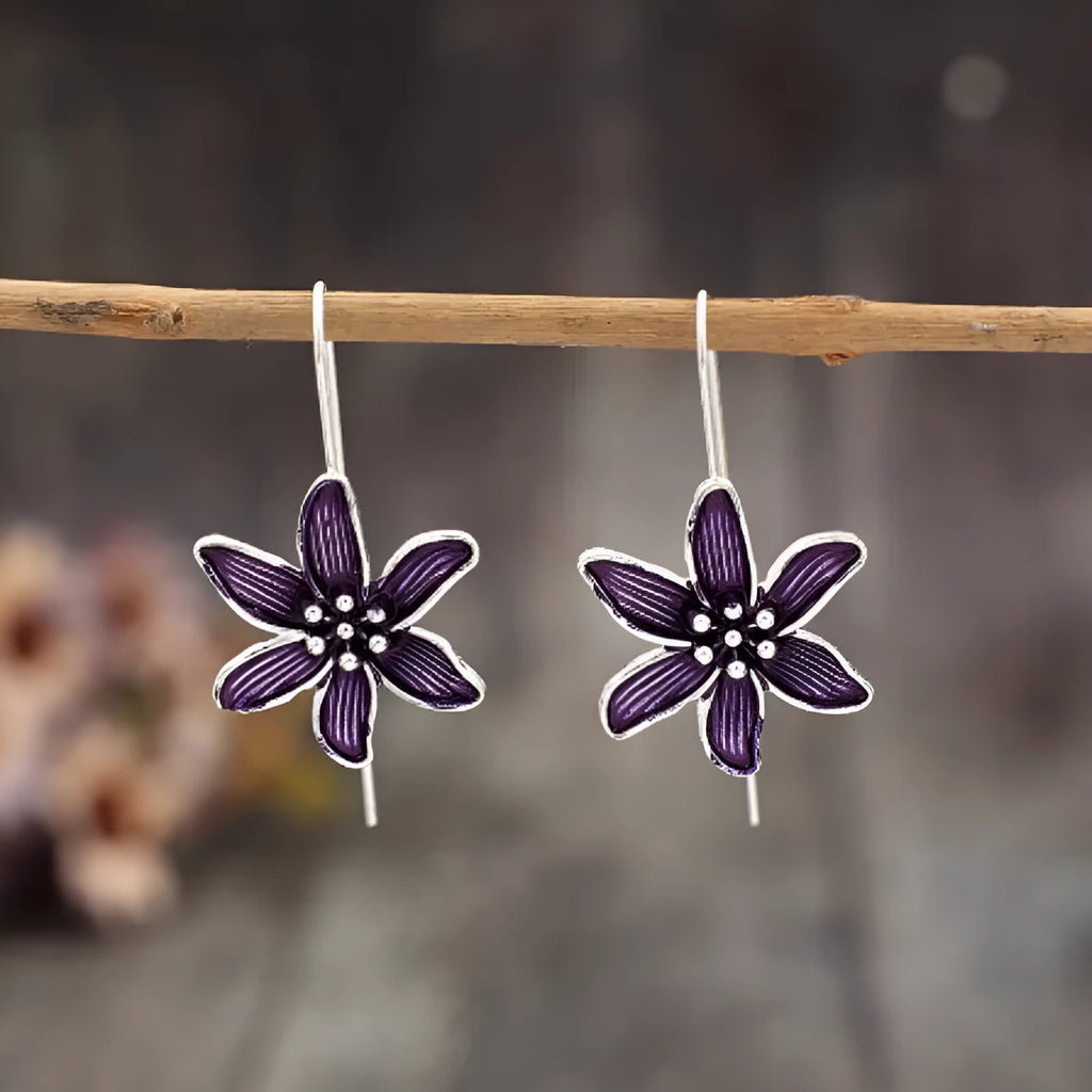 Purple flower shaped alloy earrings with electroplated finish retro design