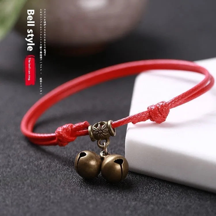 A nylon rope dog collar with brass fittings, shown in black, red, and coffee colours.