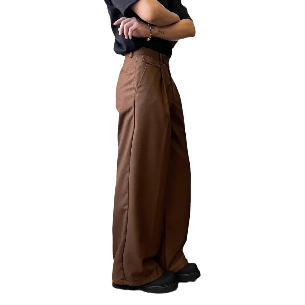Men's straight-leg casual trousers in polyester blend fabric showing drape and wider cut design