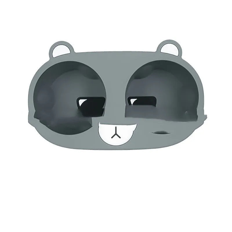 Grey silicone car cup holder insert with cartoon print for anti-shake bottle stabilisation