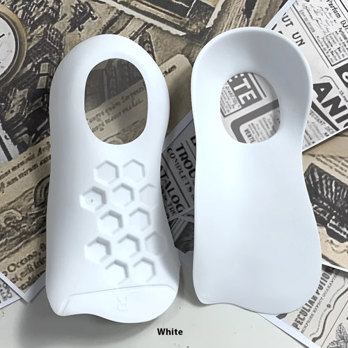 A pair of white arch support insoles for varus correction, showing the contoured shape.