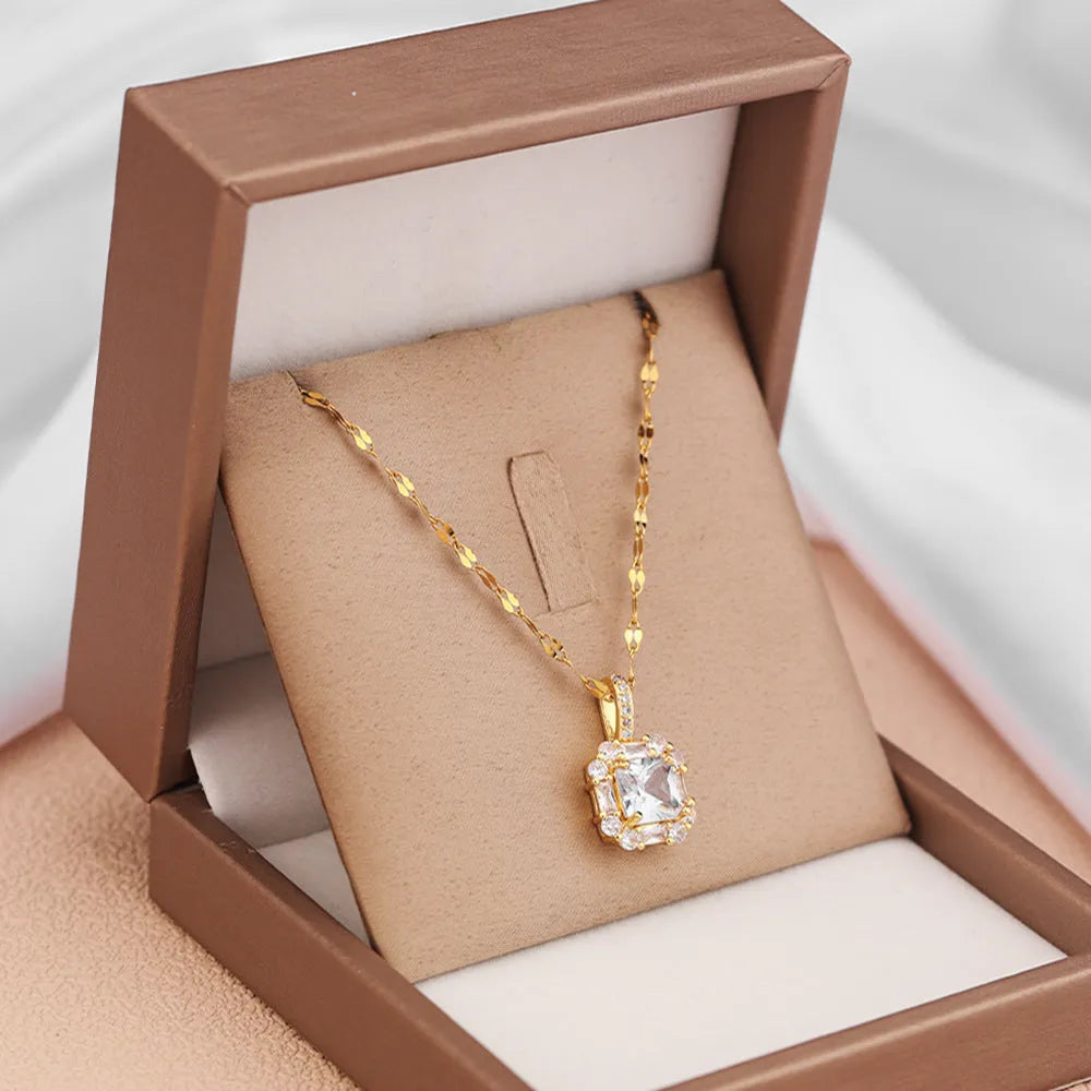 Gold titanium steel clavicle chain with geometric zircon inlaid pendant on water wave chain