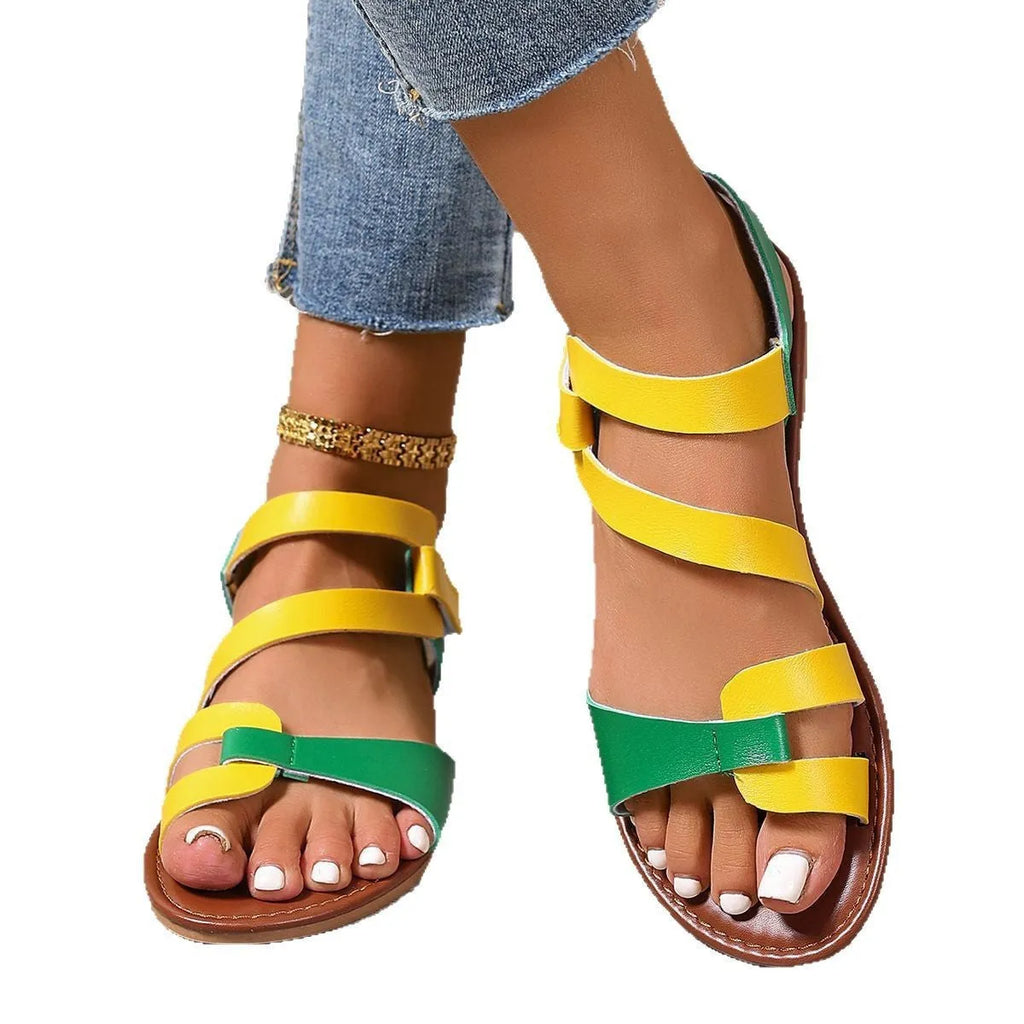 Women's flat sandals with Velcro strap in colourful, brown, and black colour options