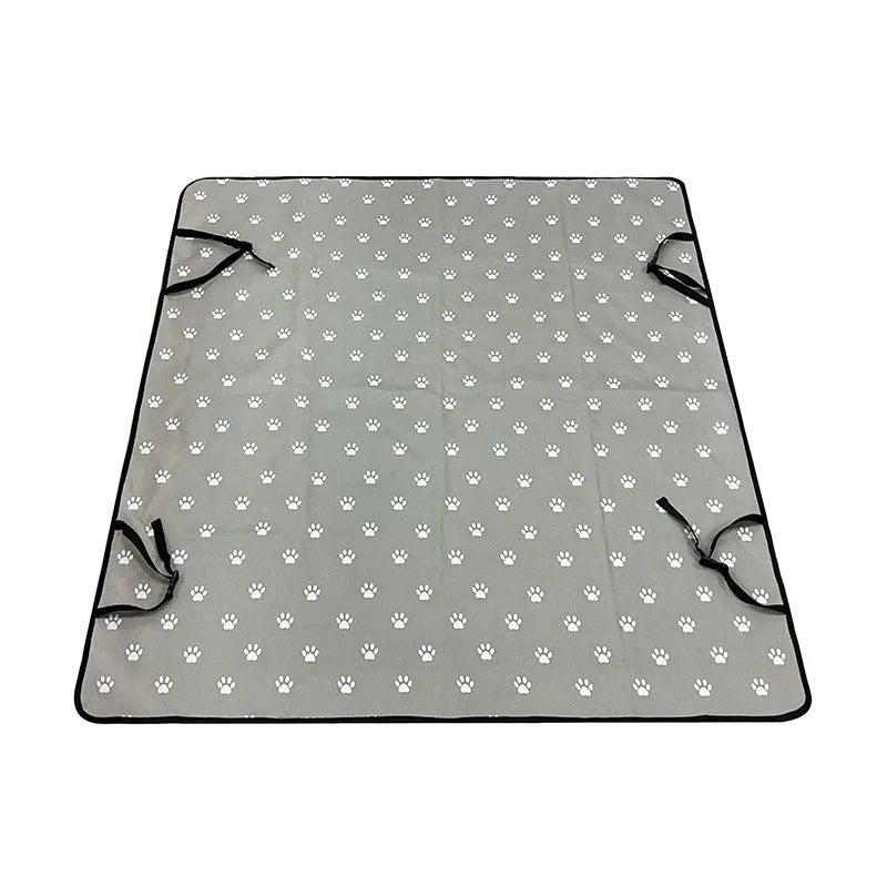 Grey car pet mat with dog bone print on rear car seat protecting upholstery
