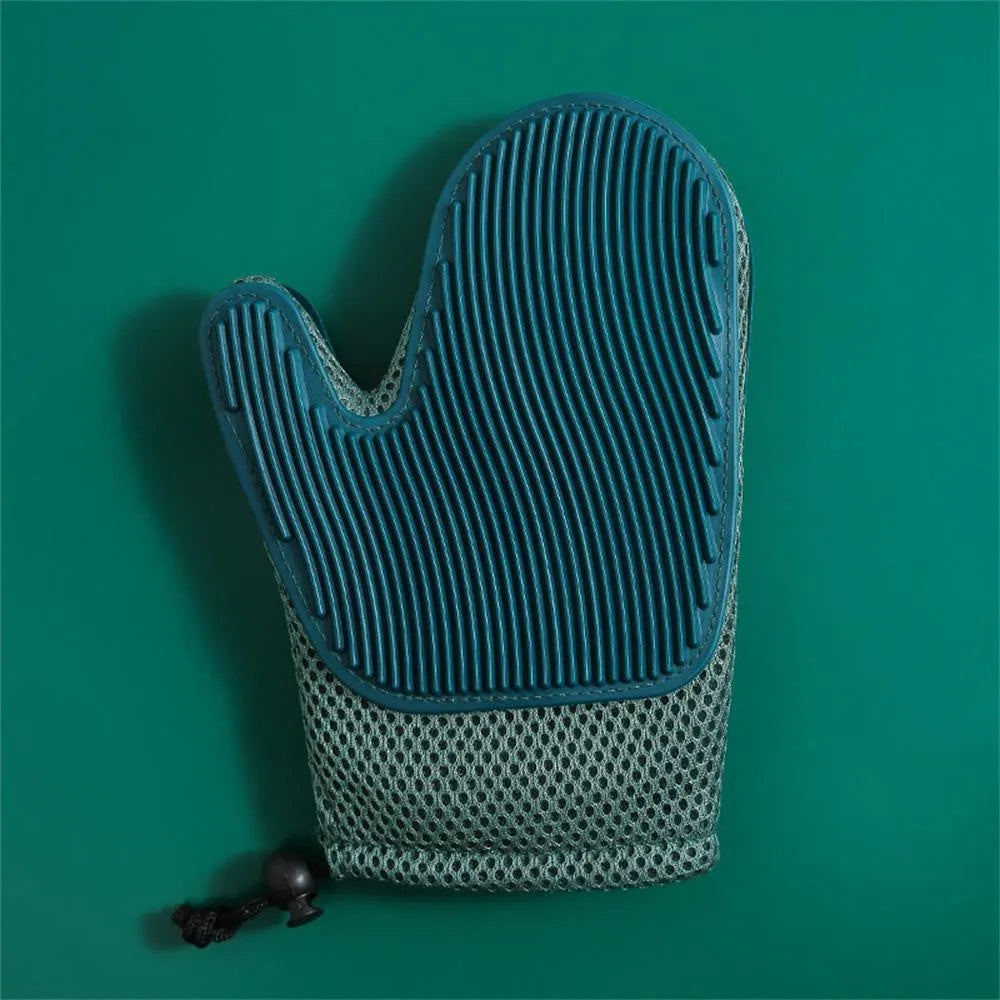 Dark blue pet hair removal glove made of mesh and TPR rubber for grooming dogs and cats.