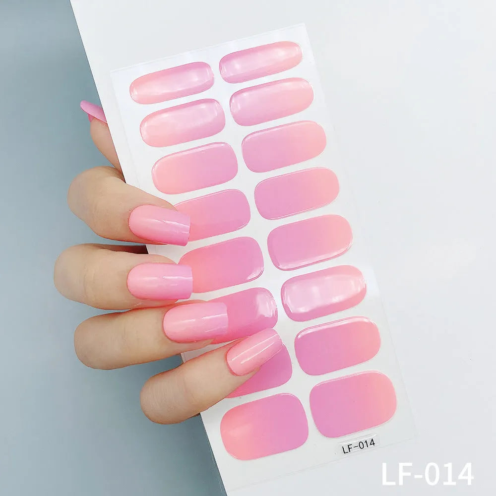 Sheet of 16 solid colour nail art sticker designs including cross, rose, and leopard print patterns.