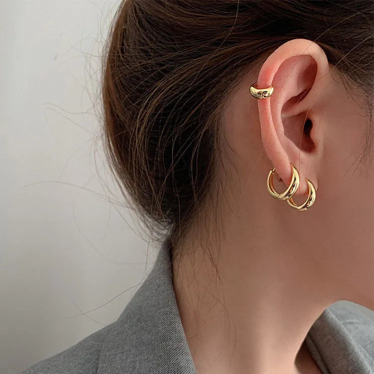 Women's geometric water drop earrings in copper with gold and silver electroplated finishes