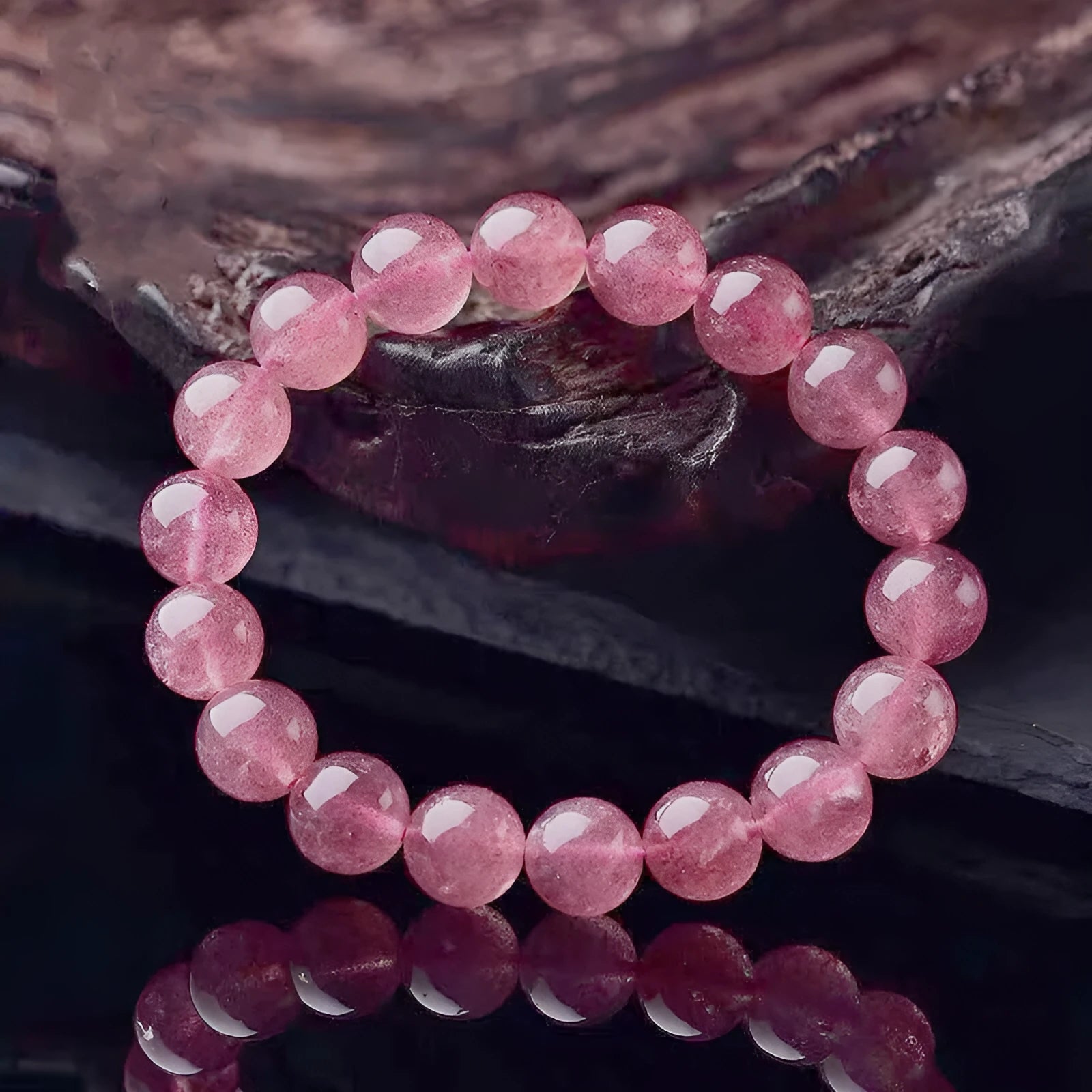Women's strawberry quartz crystal bracelet with polished beads in three size options