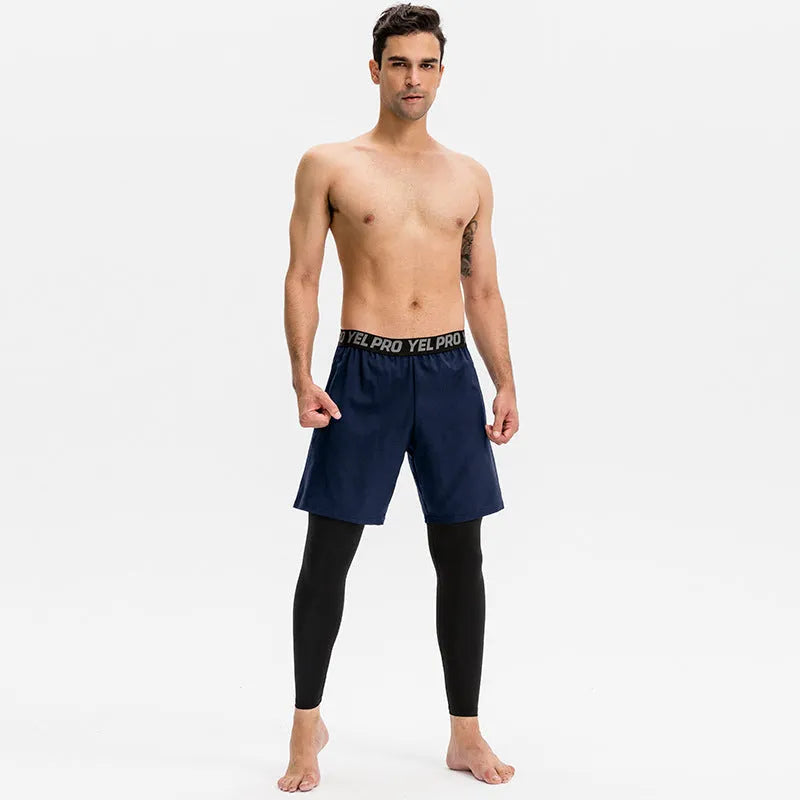 Man wearing grey elastic quick-drying sports trousers for fitness exercise.