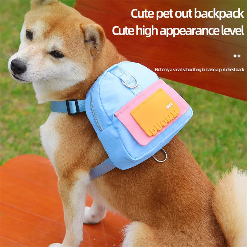 Blue adjustable dog backpack harness with storage compartments and breathable mesh panels