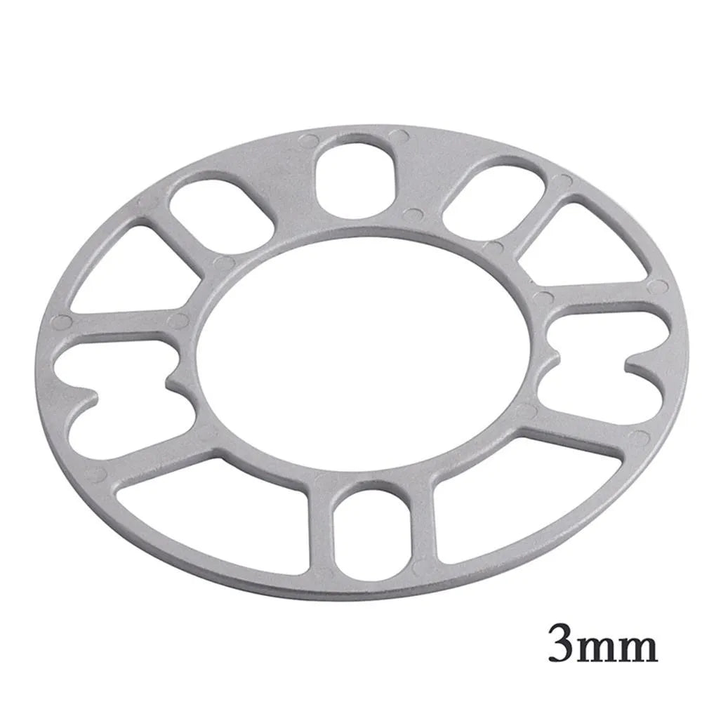 Automotive wheel hub widening gasket spacer in various thicknesses for brake clearance.