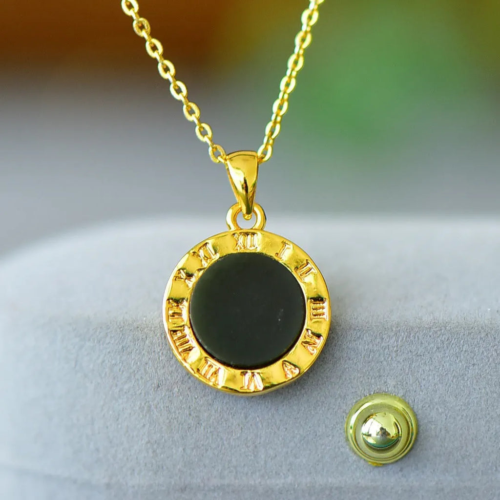 Gray Hetian jade pendant with copper inlay detailing on necklace chain