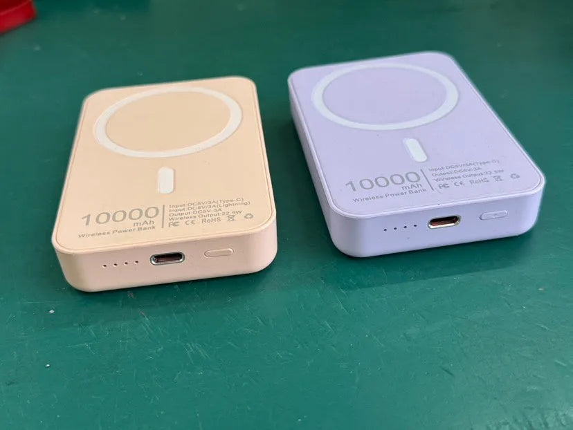 White magnetic wireless power bank with stand functionality showing 5000mAh capacity