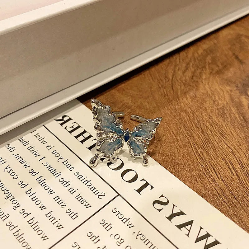 Copper women's ring featuring a creative Chinese butterfly design, available in multiple colours.