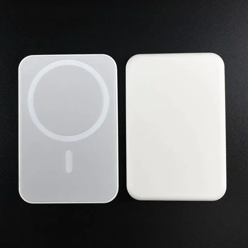 White magnetic wireless power bank with stand functionality showing 5000mAh capacity