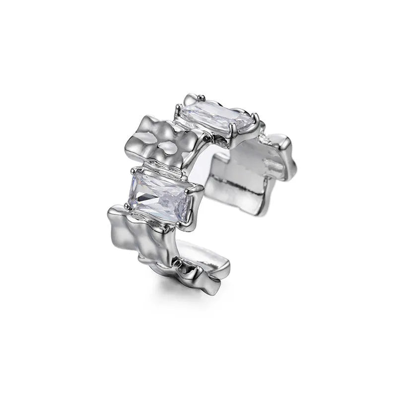 Silver geometric zircon cross ring with open centre and retro design
