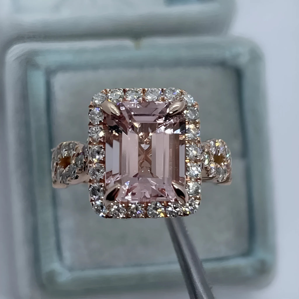 Rose gold electroplated alloy ring with geometrical design shown on hand