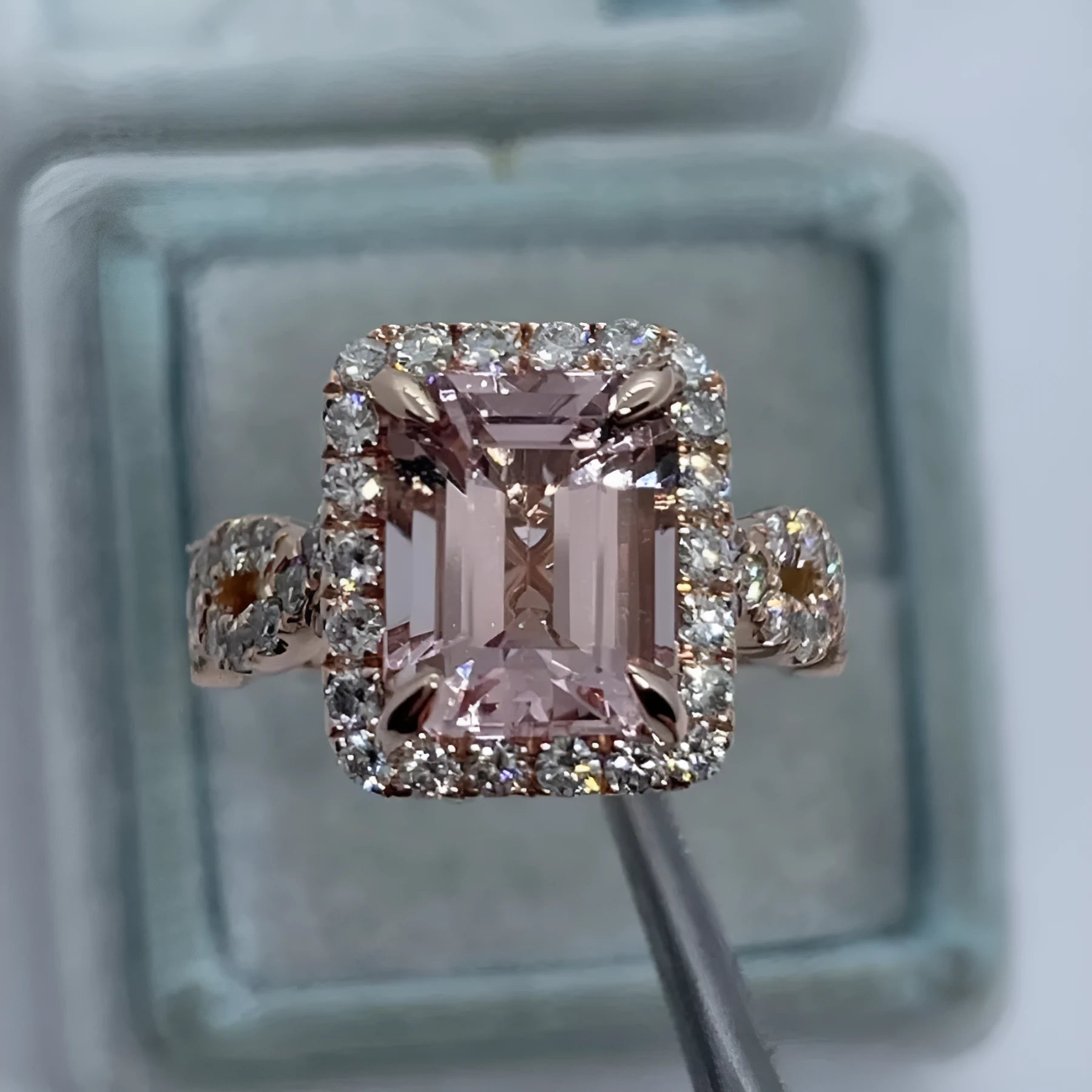Rose gold electroplated alloy ring with geometrical design shown on hand