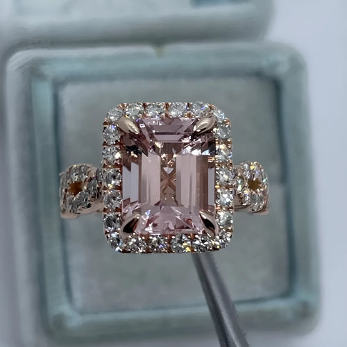 Rose gold electroplated alloy ring with geometrical design shown on hand